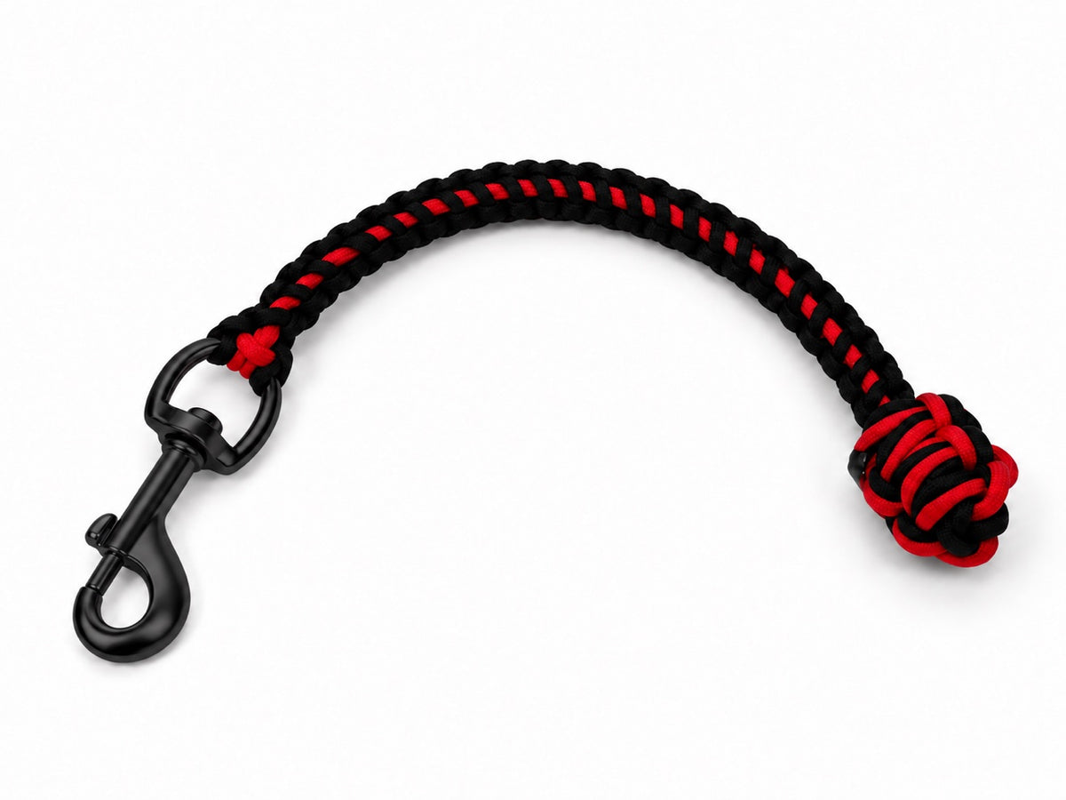 Obedience tab in the Black Widow colorway — black and red paracord